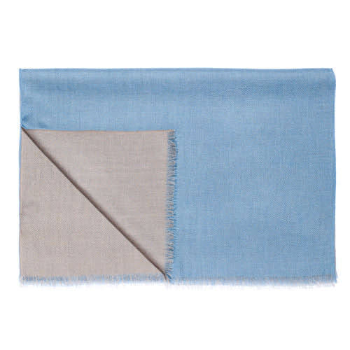 Two-tone reversible cashmere throw in blue and beige, made by Pashmina Studio in Nepal